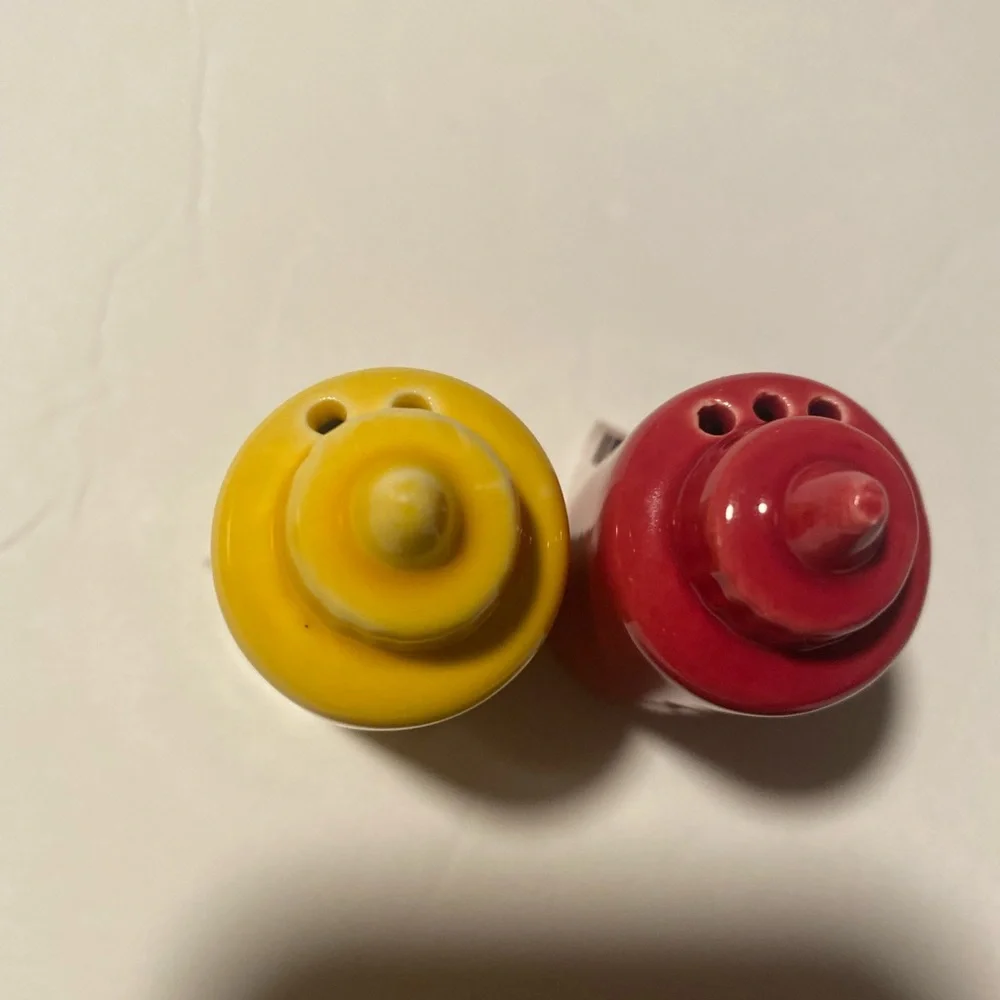 Red and Yellow Condiment Shakers